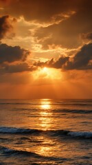 Obraz premium Fiery Sunset over Sea Water Reflecting Sun Rays between Clouds Scenery Landscape