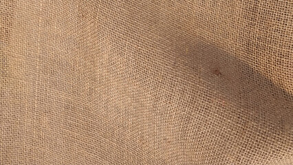 Natural jute burlap texture. Material woven from jute thread. Sack burlap texture as background