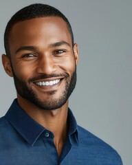 Fototapeta premium Confident Smiling Businessman in Blue Shirt Portrait Isolated