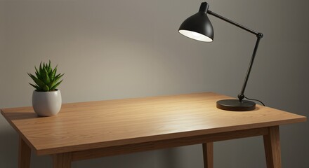 A simple wooden desk with a black adjustable lamp and a small green potted plant, illuminated by the lamp's warm light in an indoor setting.
