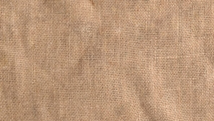 Jute pattern, rough burlap texture, canvas coarse cloth, brown woven rustic bagging. Natural hessian beige textile texture. Sack burlap texture as background