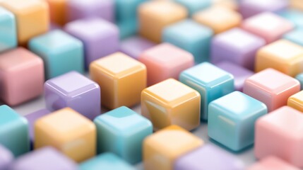 Obraz premium Pastel colored 3D cubes with glossy finish arranged in a grid pattern