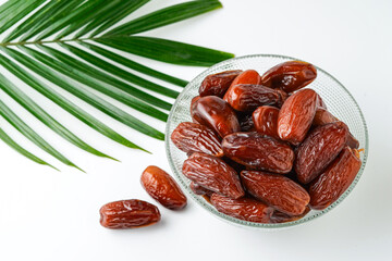Dates fruit tunisia, Tunisian honey dates, in bowl isolated on white background