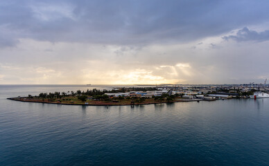 Aerial View of Honolulu Hawaii Coastline With Sunset and Urban Background