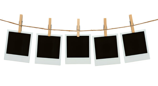 A row of five Polaroid frames pinned on a rope with clothespins, showcasing simplicity and an anticipation of cherished memories, isolated on white or transparent background. PNG