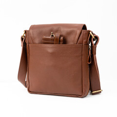 Blank brown leather shoulder bag isolated on white background, perfect for leather product catalogue