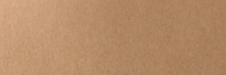 Background of brown kraft paper or cardboard texture. top view.