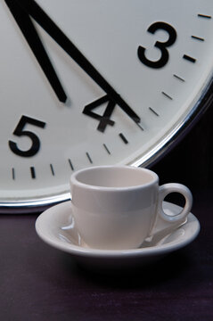 clock and coffee cup