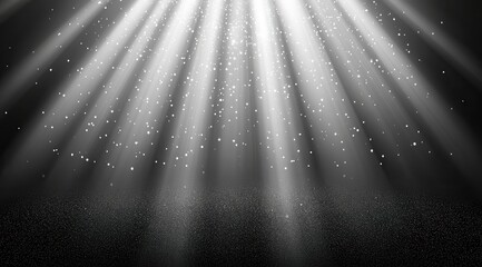 Bright light rays radiate from above, illuminating a dark space  Particles of light scatter throughout