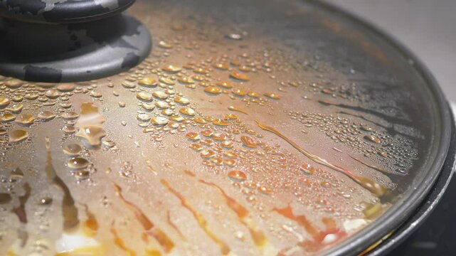 Cooking a flavorful dish with a covered pot on a sunny day