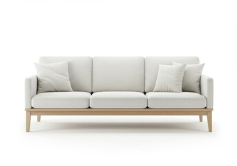 White sofa with wooden base and two pillows on a white background in studio
