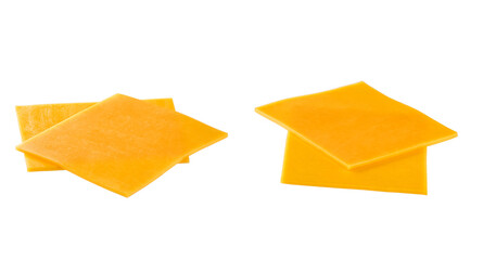 slices of red cheddar cheese isolated on a white background .