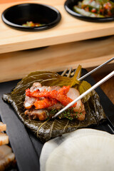 Pork and radish kimchi with perilla leaf pickles