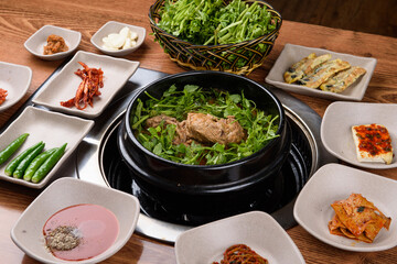 Korean style duck soup table setting