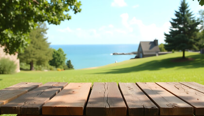 Wooden table, empty table, Green lawn, grass and sea background. hard wood table, sea, sea side, summer, outdoor, sunny day, sunlight, country side, garden, field, natural vibe, good for key up.