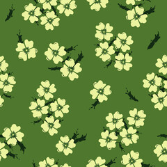seamless pattern with pale yellow flowers and dark green leaves with green background