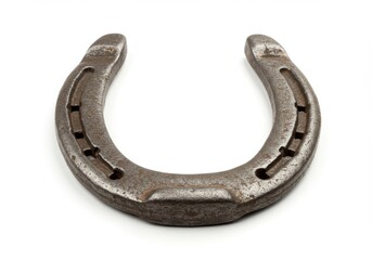 A metal horseshoe resting isolated on white background