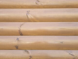 Beautiful wooden wall. Texture of logs. Natural wood pattern. Wooden background