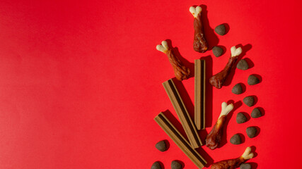 Surreal candy feast with chocolate pebbles and bone-shaped sweets, celebrating Lunar New Year and Dia de los Muertos