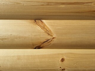 Natural wood grain. Unpainted logs. Wooden background. Close-up of wood texture