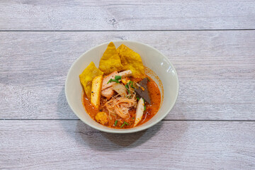 Noodles with red pork, dumplings, meatballs