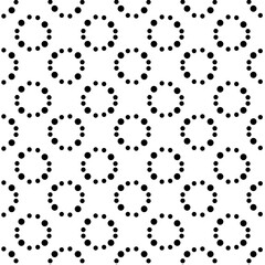 Circles of black small dots on a white background