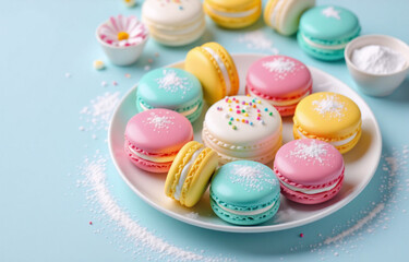 A plate of colorful pastel macarons, dusted with powdered sugar and sprinkles, sits on a light blue background.  Sweet treats, perfect for a celebratory occasion.