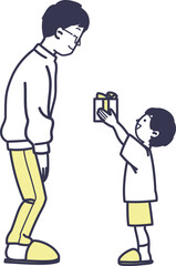 父の日にプレゼントを渡すこども