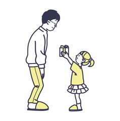 父の日にプレゼントを渡すこども