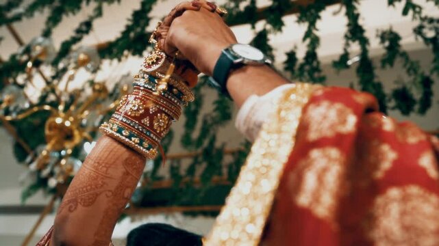 Indian wedding ritual - Bride and Groom holding 
 marriage mangalsutra  Closeup Shot, cinematic style motion video