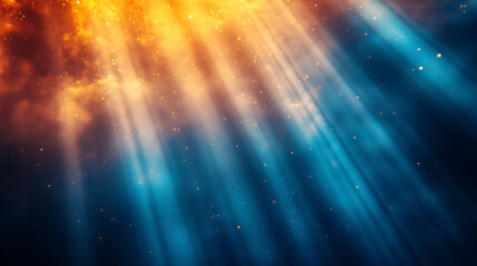 Abstract celestial rays of light background in orange and blue colors with bokeh effect and sparkle dust
