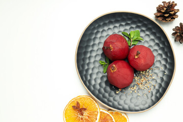 Tasty and delicious food concept - pear in wine