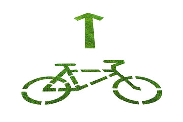 Close-up: Isolate bicycle road sign cut out of green grass with an up arrow. Top view on a white background.