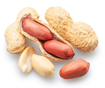 Peanuts whole and cracked isolated on white background. File contains clipping paths.
