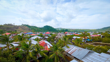 Rural village in the Philippines. Typical tin roofs and plywood construction. Settlers, Surigao Del Norte, Philippines.