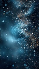 Obraz premium Cosmic Dust Cascade: Immerse yourself in a stunning spectacle of celestial beauty with this breathtaking image, where shimmering particles dance across a canvas of deep blues and celestial gold.