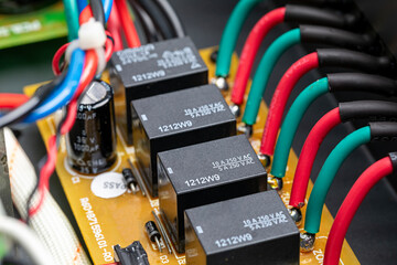Audio relay circuit board in amplifier for connecting to speakers