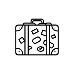 Suitcase with Travel Stickers and Folded Clothes Peeking Out Representing Vacation Planning