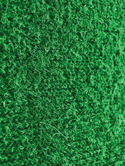 Green textured surface close-up