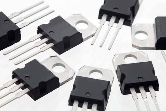 Plastic transistor, model 7812 voltage regulator encapsulated TO220, isolated on white background