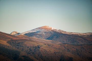 Majestic gorbea mountain glowing under a clear blue sky in the beautiful region of aiaraldea,...