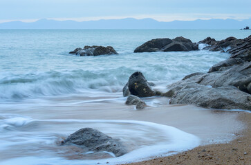 Ocean waves crashing onto the rocks at Tasman Bay. South Island. New Zealand.