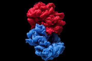 Abstract ink explosion of red and blue swirling in a dynamic composition