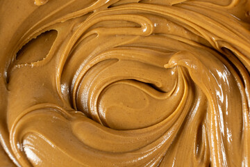 Smooth Nut Butter Swirl as Culinary Background