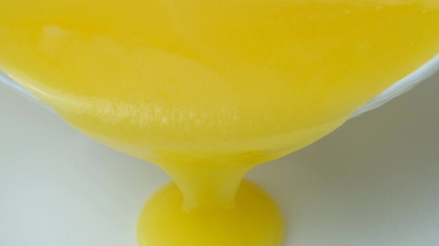 Smooth Flow Of Fresh Ghee Butter In Slow Motion