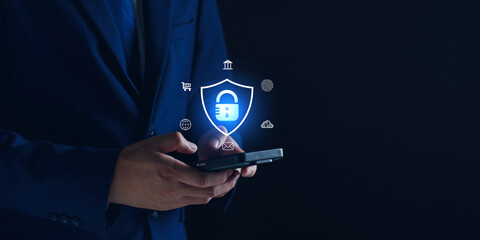 Network security system, businessman using safety app on smartphone, personal information and cyber security Tech Services, Internet safety, Digital online protection.