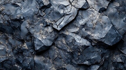 Dark gray jagged rock face detail with sharp edges and stone textures.