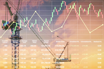 Colorful silhouette image of tower cranes working on site with stock financial symbol of graph, chart data and candlesticks on twilight sky image. Image use for business and industry presentation.