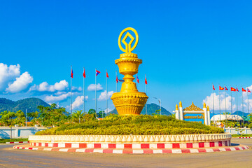 Golden traffic circle roads streets and cityscape Luang Prabang Laos.