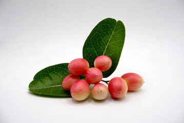 Ripe red currants, healthy red berries bunch, fresh fruit on white background.